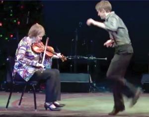 Liz Carroll and Nic Gareiss fiddle and dance at “A Christmas Celtic Sojourn” performance at the Cutler Majestic Theatre on Dec. 9, 2009. Courtesy WGBH